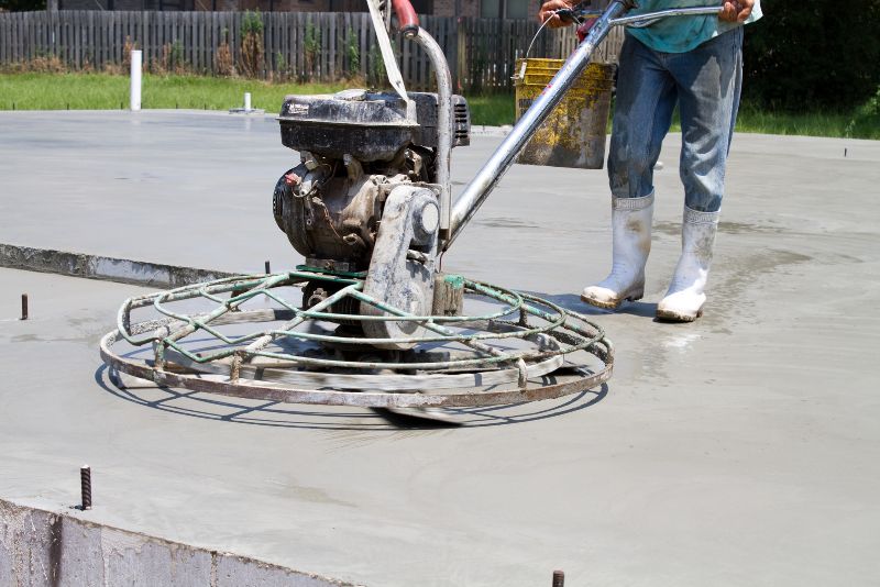 Concrete polishing machine finishing a slab surface in Townsville