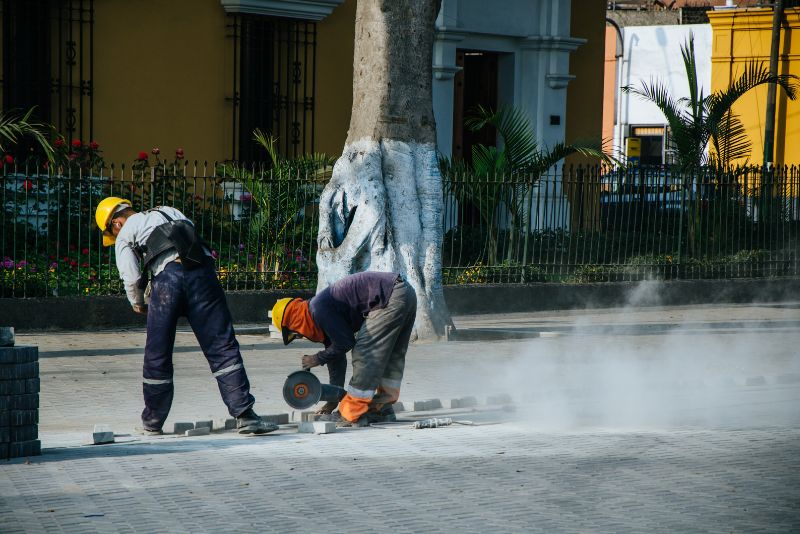Concreters laying paving at a Townsville job site